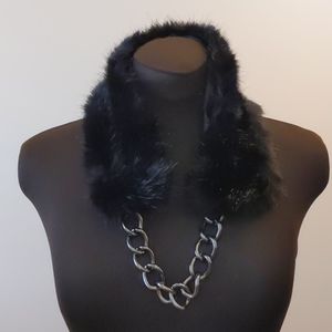 Black faux fur collared with chain